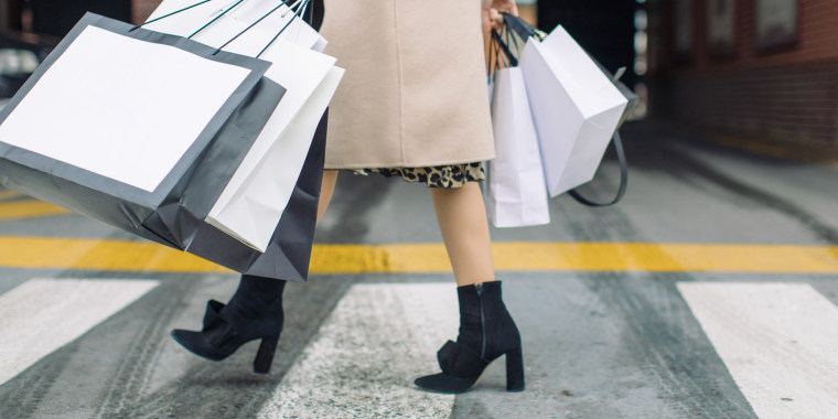 Woman Carrying Shopping Bags
