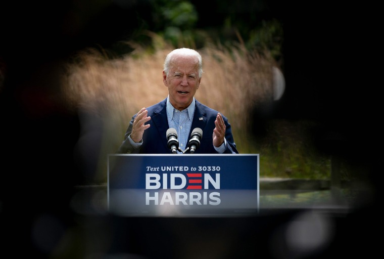 Image: Democratic presidential candidate Joe Biden speaks outside the Delaware Museum of Natural History in Wilmington, Del