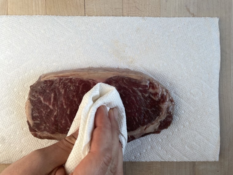 Pat steak completely dry before seasoning.