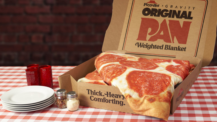 The blanket looks just as tempting as a Pizza Hut pizza.