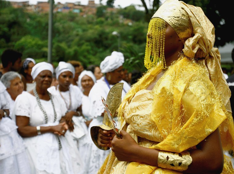 As a child, I was told that Vodou was scary and sinful. It wasn't until much later that I learned of its true beauty. The worshipper pictured here is dressed as Oshun, the river deity.