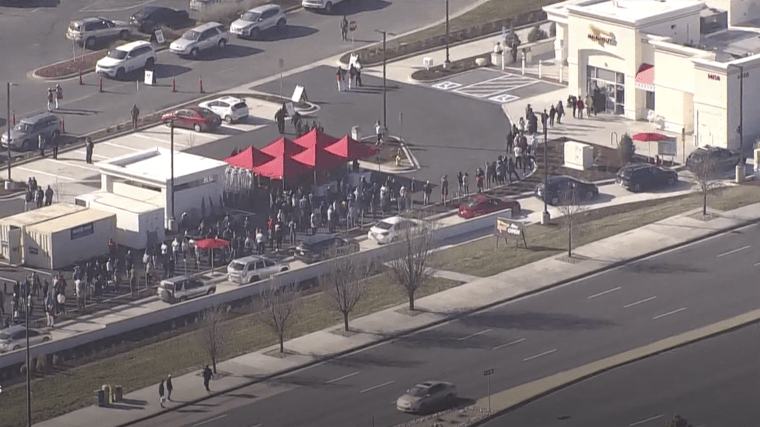 People wait outside the In-N-Out in Aurora, Colorado.