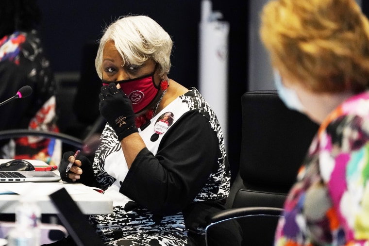 Virginia State Sen. Louise Lucas, D-Portsmouth, adjusts her mask as she chairs a committee hearing in Richmond on Aug. 19, 2020.