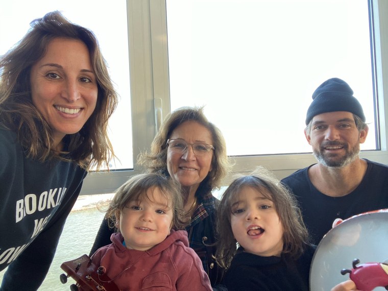 MSNBC anchor Yasmin Vossoughian, left, with her mom, husband and two children.