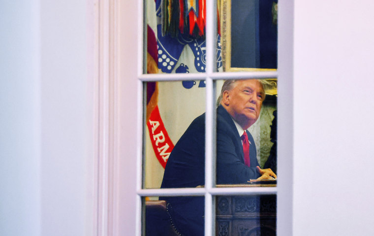 President Donald Trump sits at his desk in the Oval Office on Nov. 13, 2020.