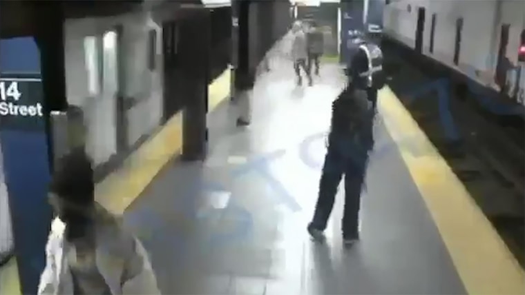 A man was arrested in New York City after he pushed a woman onto the subway tracks before an incoming train came into the station. The woman fell between the train tracks and narrowly survived the incident with no major injuries.