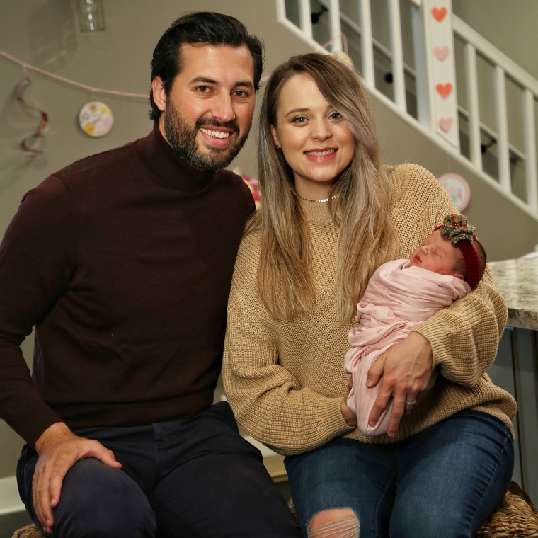 Jinger Vuolo and husband Jeremy with their new baby girl