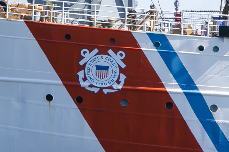 Image: The logo of the United States Coast Guard can be seen on the hull of the American sailing training ship \"Eagle\".