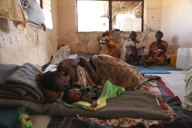 Image: Ethiopian refugees rest in Qadarif region, easter Sudan, Friday, Nov 20, 2020. Thousands of Ethiopians fled the war in Tigray region into Sudan.