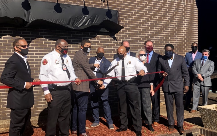 Image: Jackson Mayor Chokwe Lumumba, third from the left, joins dignitaries for a ribbon cutting unveiling the city's new real time command center on Nov. 19, 2020.