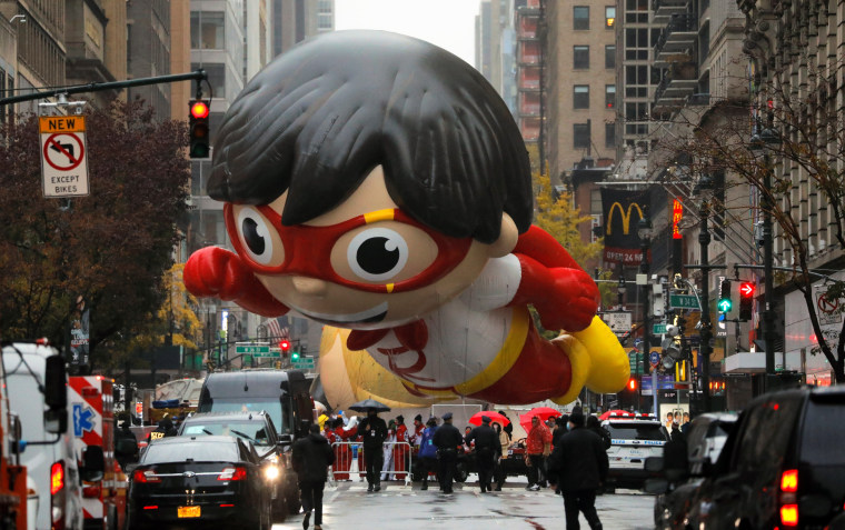 Image: A balloon depicting Red Titan, a character from \"Ryan's World\", is seen of ahead of the 94th Macy's Thanksgiving Day Parade closed to the spectators due to the spread of the coronavirus disease (COVID-19), in Manhattan