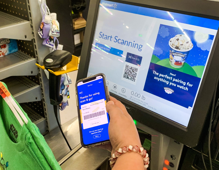 At Walmart's in-store self-checkout kiosks, Walmart Plus members scan the scan-and-go barcode with their phone to pay for their purchases quickly.