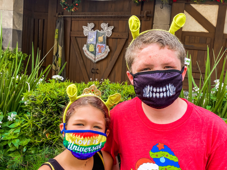 Saving on gas and groceries with Walmart Plus gives me the opportunity to buy special treats for my kids, like these "Shrek" ears they desperately wanted during our Universal day trip.