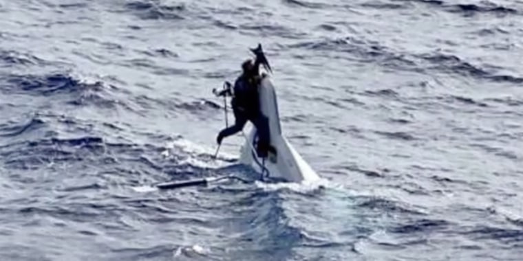 Florida truck driver Stuart Bee, 62, was found by a cargo ship clinging to his 32-foot boat nearly 90 miles from the Florida coast in an incredible rescue. 