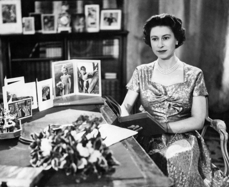 The queen is seen in the Long Library at Sandringham shortly after making the traditional Christmas Day broadcast to the nation in 1957. 