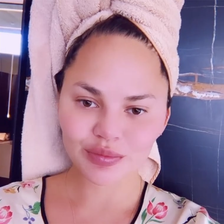 Chrissy Teigen takes her first shower since loss of her son, Jack.
