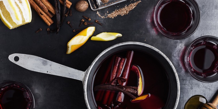 Mulled wine is a warm drink that is made by simmering wine with brandy or cognac, sugar and wintry spices.