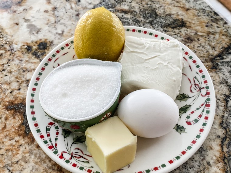 The simple ingredients that go into the cream cheese filling: lemon juice, cream cheese, butter and an egg yolk.