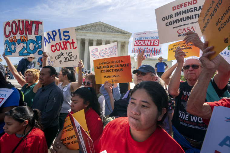 Image: Immigration activists rally outside the Supreme Court during arguments over a Trump administration plan to ask about citizenship on the 2020 Census on April 23, 2019.