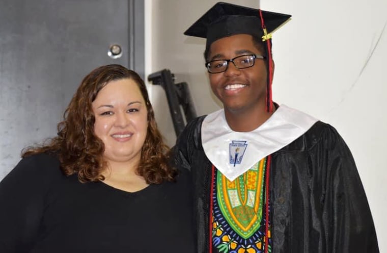 Image: Melinda Roellig with her student Carey Walls at his graduation in 2018.