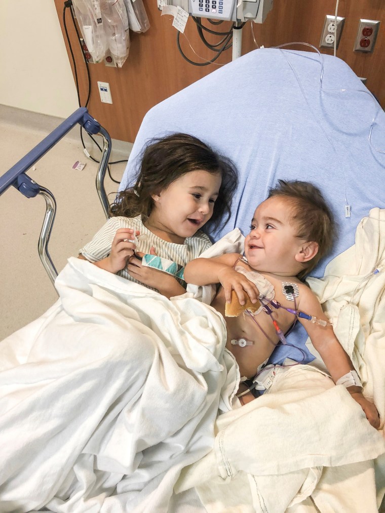 Olivia and Eli spend time together on the day of the transplant in 2019.