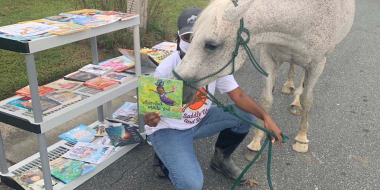 Caitlin Gooch also hopes that her program shows children that Black people can be equestrians, too. Her middle daughter already talks about being a horse trainer when she grows up. 