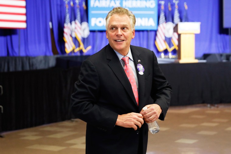 Virginia governor Terry McAuliffe arrives at the election night rally for Democratic gubernatorial candidate Ralph Northam on the campus of George Mason University in Fairfax
