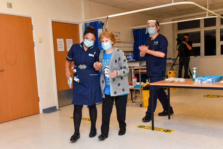 Image: Nurse May Parsons walks with Keenan at University Hospital in Coventry