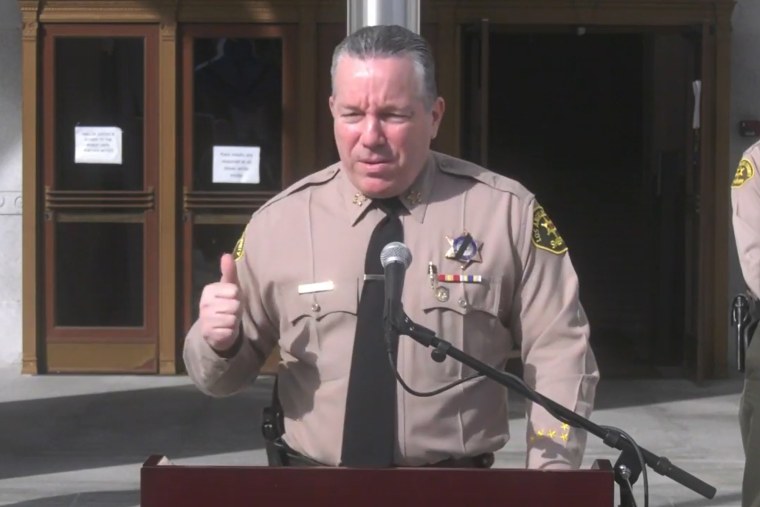 Los Angeles sheriff Alex Villanueva talks about the arrest of 158 people who attended a party that was deemed a "super spreader" event at a press conference on Dec. 8, 2020.