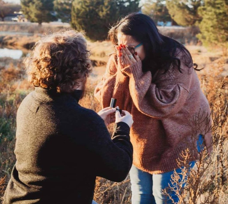 Image: Jamie Bassett asks Stephanie Lynn Smith to marry him in a field in Lubbock, Texas