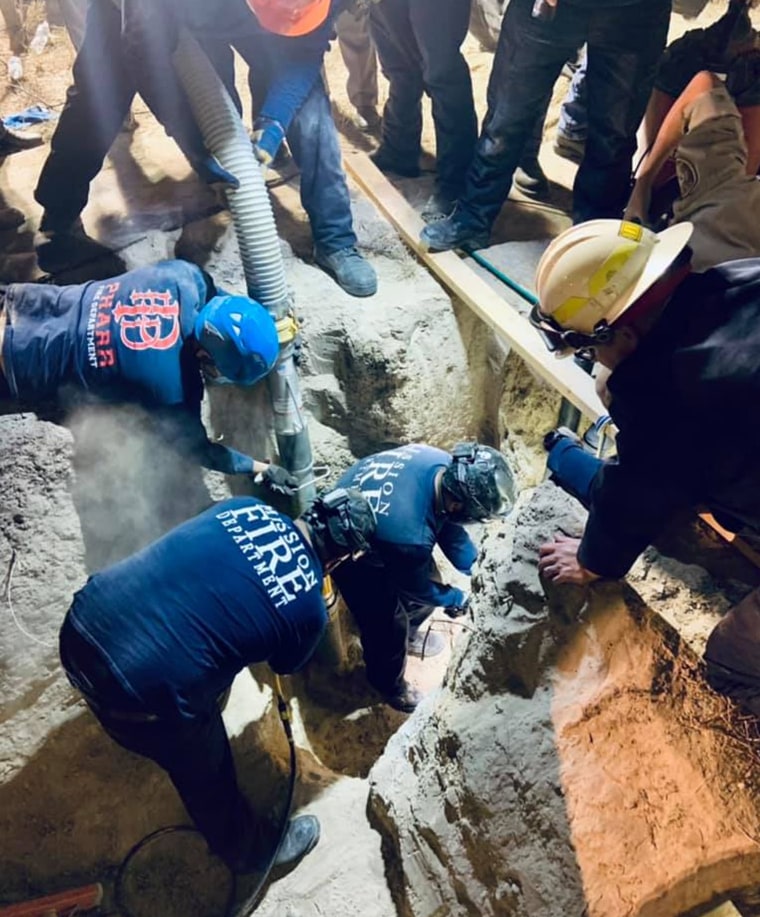 Image: Boy falls down well