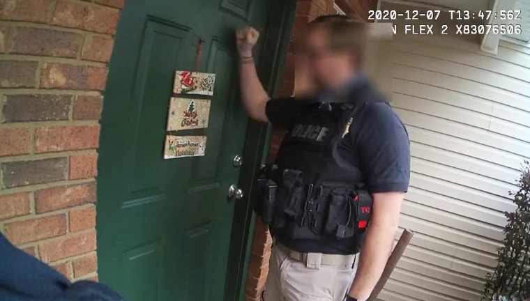 Body cam footage, which has been blurred by law enforcement, shows a police officer knocking on the door of former Florida health department employee Rebekah Jones in Tallahassee on Dec. 7, 2020.