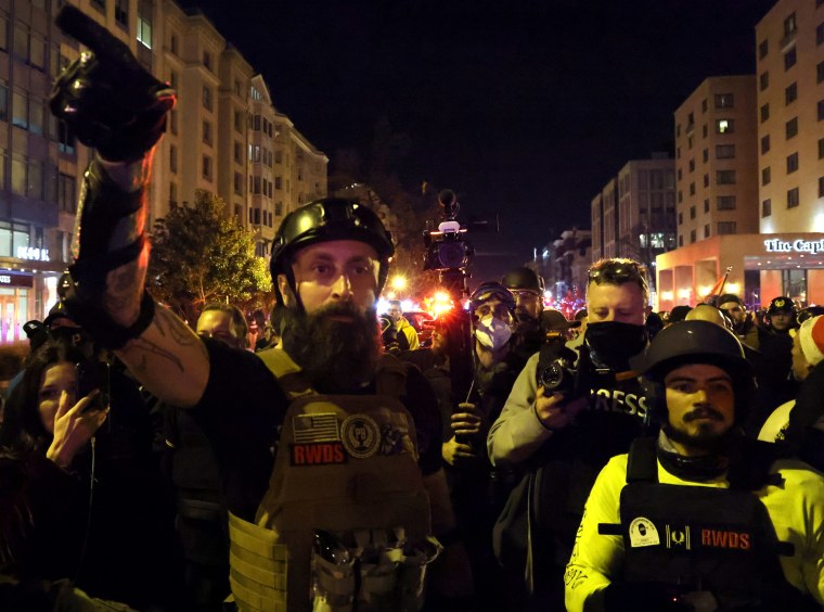 Image: People take part in a rally to protest the results of the election, in Washington