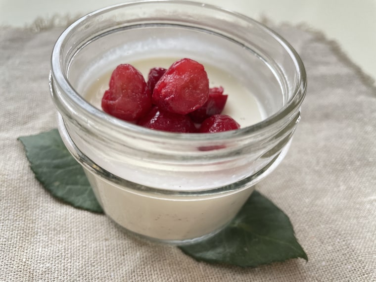 Individually jarred panna cotta is the perfect dessert for the holidays, dressed up with whatever toppings you prefer.
