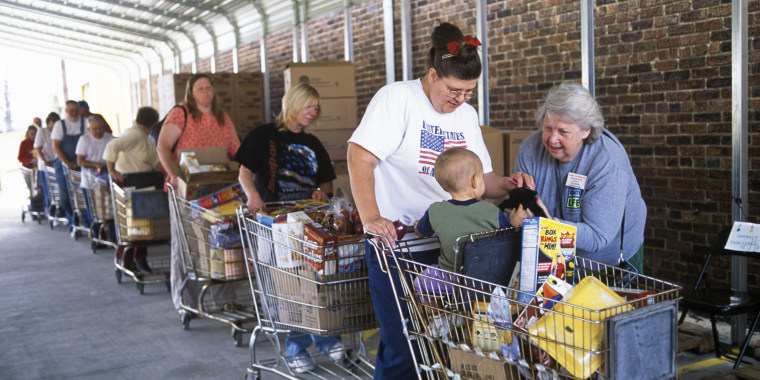 People with Shopping Carts at McArthur Foodbank