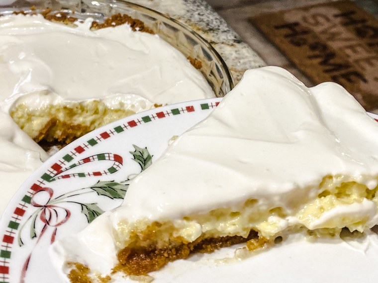 This delicious cheesecake has a custardy base and is made perfect by its buttery crust and sour cream icing.