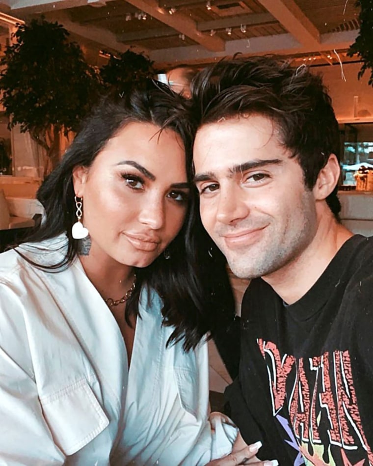 Demi Lovato and Max Ehrich pictured after their engagement announcement in July. 