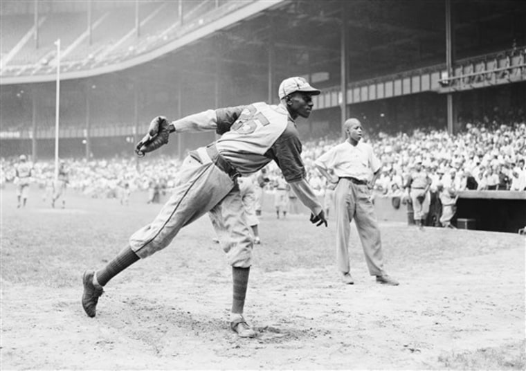Kansas City Monarchs pitching great Leroy Satchel Paige warms up at New York's Yankee Stadium Aug. 2, 1942 for a Negro League game between the Monarchs and the New York Cuban Stars.