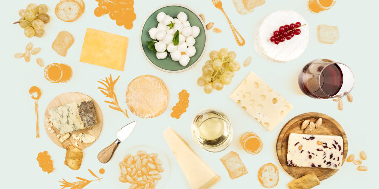 Various types of cheese with wine on a white background