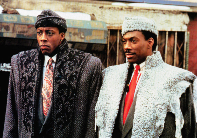 COMING TO AMERICA, from left, Aresnio Hall, Eddie Murphy, 1988, (C)Paramount/courtesy Everett Collecti