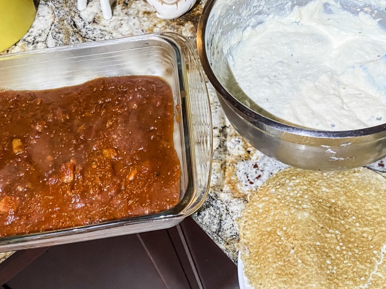 Tomato sauce, manicotti and ricotta, ready to turn into a delicious dinner.