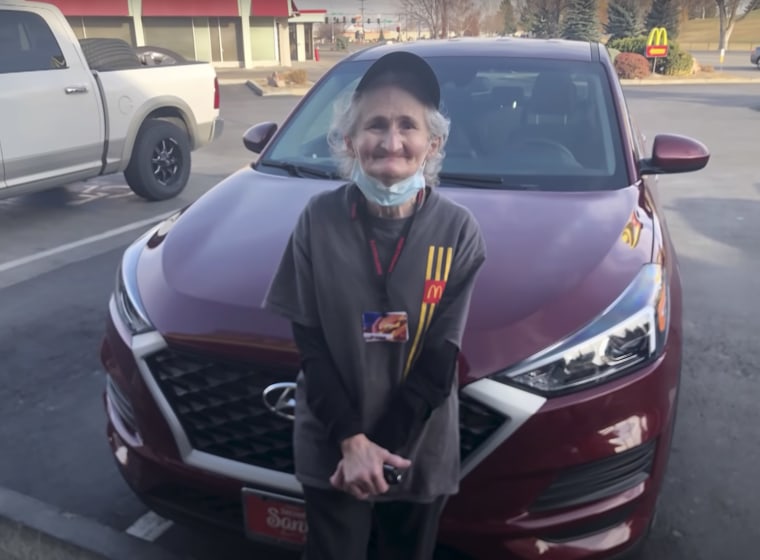 Diana Boldman poses next to her new Hyundai Tucson SUV.