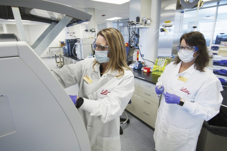 Image: Researchers prepare cells to produce possible Covid-19 antibodies for testing in a laboratory in Indianapolis in May 2020.
