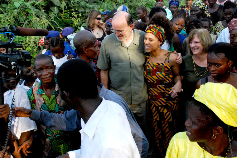 The Bumpe community celebrating the arrival of Sarah Culberson with her adoptive parents in Sierra Leone in 2006.