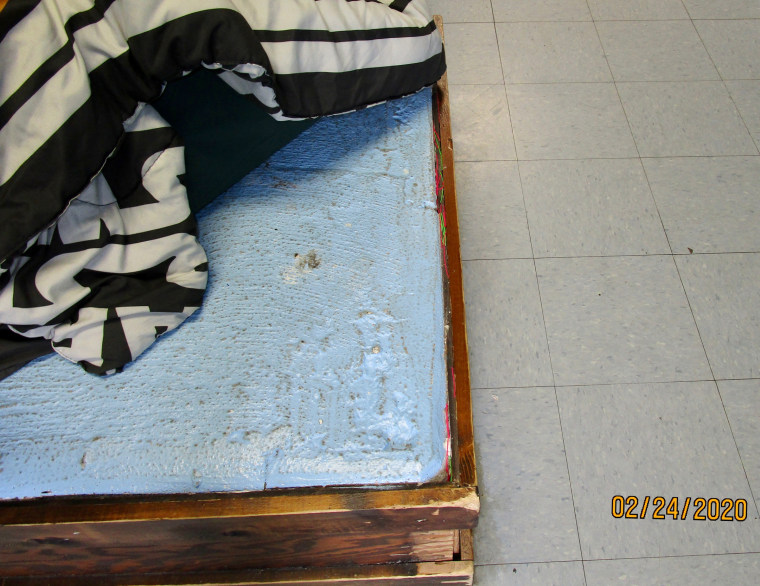 A concrete slab at Sequel's Courtland facility where thin mattresses are placed for children to sleep.