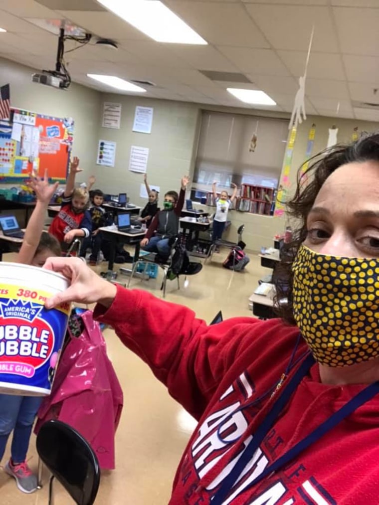 Janet Throgmorton, principal of Fancy Farm Elementary School in Graves County, Kentucky, with students. 