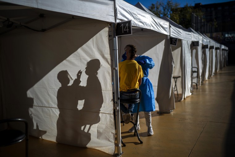 Image: A volunteer undergoes a screening for the coronavirus