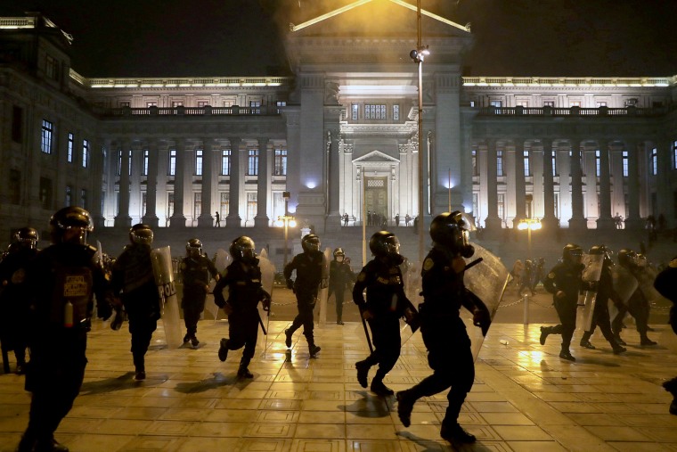 Image: FILE PHOTO: Demonstrators clash with police during protests that led to the resignation of Peru's interim President Manuel Merino, in Lima