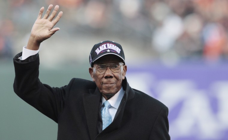 FILE - Former Negro League baseball players, from left, Willie