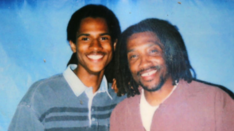 Image: Mike Africa, Jr. with his father, Mike Africa, Sr.